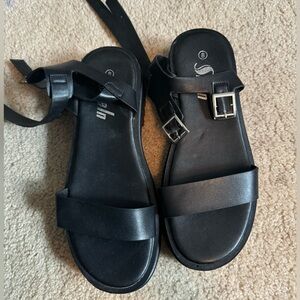 Never worn black sandals